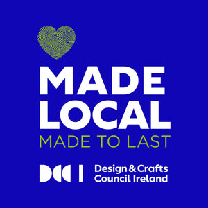 Made Local Logo by the design crafts council Ireland - made to last give in blue background and gold text