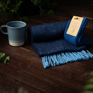 Blue and white mug with herringbone scarf and navy socks eco friendly gifts for him. 