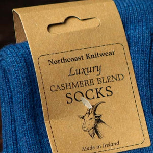 Eco friendly gifts for him Navy socks as part of a christmas gift