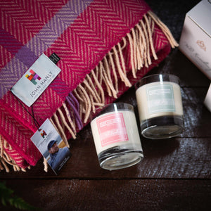 This irresistibly soft throw and fragranced candle are sure to add luxury to your living space or outdoor living!