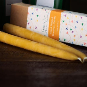 Two beeswax candles part of the ceramic holder gift set which are non toxic and eco-friendly