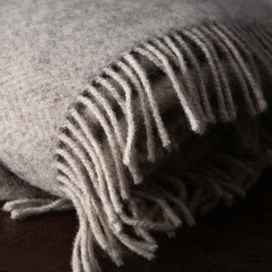 Environmentally friendly crafted by Hanly Woollen Mills.  Light Grey Herringbone weave has subtle flecks throughout enhancing the natural wool.