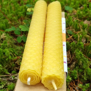 Rolled natural beeswax candle image on natural background Christmas stocking filler
